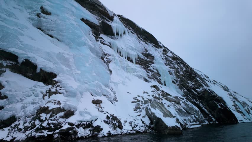 Frozen Rocky Mountains Surround The Nuuk Fjord In Greenland, Close View