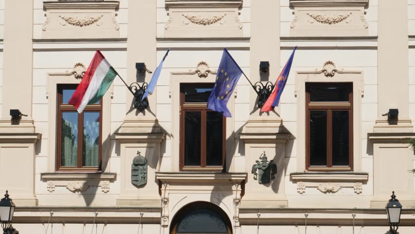 Static shot of The flags on the town hall of Veszprem, Hungary