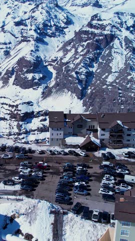 Santiago Chile. Ski station center at snowing Andes Mountains near Santiago Chile. Snow mountain landscape at winterness. Winter ness travel destination. Winter ness tourism travel.