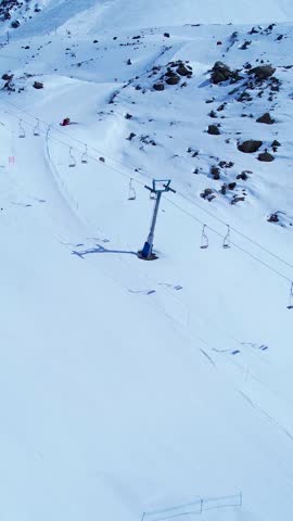 Santiago Chile. Ski station center at snowing Andes Mountains near Santiago Chile. Snow mountain landscape at winterness. Winter ness travel destination. Winter ness tourism travel.