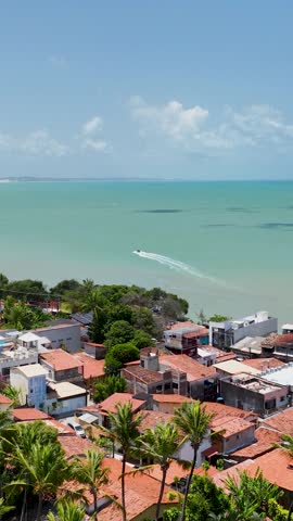Scenic cliffs at Pipa Beach in Rio Grande do Norte. Brazil Northeast. Vacations landscape. Paradise scenery. Pipa Beach at Rio Grande do Norte. Scenic cliffs on the beach. Brazil Northeast.