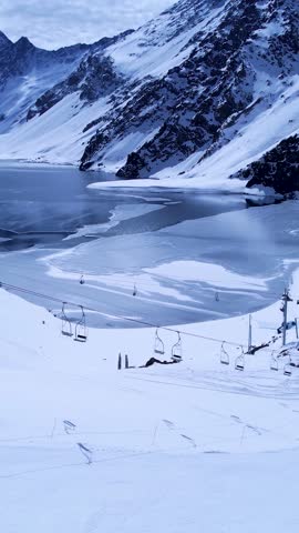 Ski Station Skyline In Santiago Chile. Snowy Mountains. Del Inca Lake. Travel Background. Ski Station Skyline In Santiago Chile. Ski Station Landscape. Snowcapped Valley.