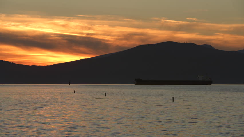 Sunset English Bay Paddle Boarding Vancouver 4K UHD.Sunset paddle boarding on English Bay. Vancouver, British Columbia, Canada. 4K, UHD.
