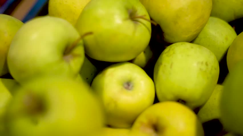 Abundance of Fresh Green Granny Smith Apples in a Large Group