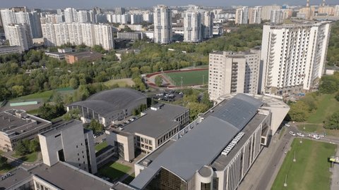 Drone Flight Rotating Left beside Campus Complex