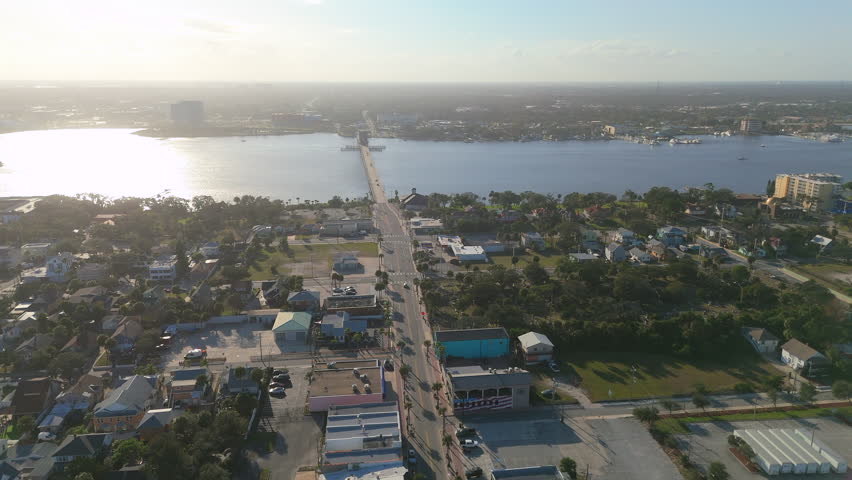 Wide aerial panoramic view of Daytona Beach Florida with river and bridge