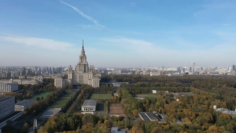 Aerial View of University Tower Surrounded by Autumn Foliage