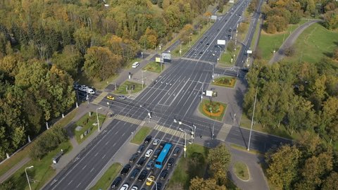 Backward Drone View over Highway Crossroads