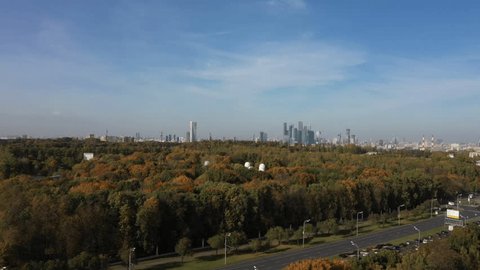 Forward Drone View over Autumn Forest Observatory