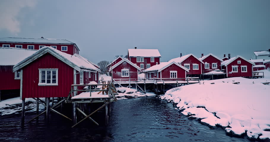 Lofoten islands, Norway Winter panorama landscape of Reine village fishing harbour, mountain peaks and Nordic sea