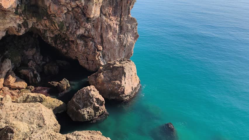 Coastal Cliff Landscape Above the Ocean. Sea Cliff Along the Ocean Coastline. Sea Cliffs by the Shore. Rocky Coastal Cliff Overlooking the Sea.