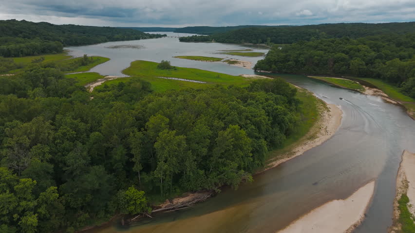 Flowing River With Forests Near Lake Eucha In Tagg Flats, USA. Aerial Shot