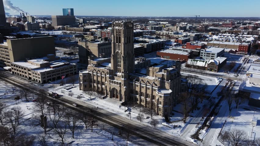 Cinematic Establishing Drone Shot Above Scottish Rite Cathedral on Winter Day in Indianapolis.