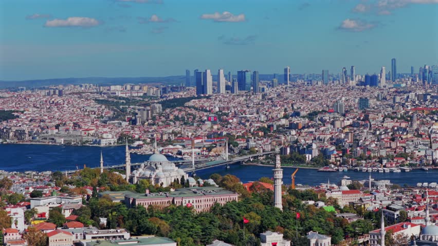 Morning Istanbul Turkey Türkiye aerial drone sunny blue clear skies autumn bridge Blue Mosque synagogue temple cityscape skyscrapers Fatih Yenikapı Port Bosphorus Strait Harbor view circle left motion