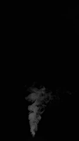 Slow Motion Shot of Slowly Rising Steam, Isolated on Black Background.