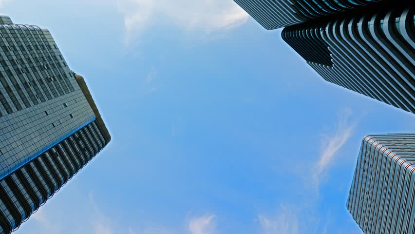 This captivating visual presents the magnificent skyline of a bustling modern city CBD, where rows of gleaming skyscrapers and sleek office buildings stand tall. These towering high-rise structures serve as the core of the business district, embodying the prosperity and dynamism of urban commerce. The composition highlights the harmonious integration of modern architectural aesthetics and functional business spaces, capturing the vibrant energy of the financial hub and making it ideal for business promotions, urban planning showcases, and corporate-themed creative projects.