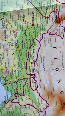 Political map of Nepal highlighting national borders, major cities, and surrounding countries in the Himalayan region. The map clearly shows Nepal’s geographic position between India and China, including key locations and terrain features, making it ideal for educational content, travel documentaries, geopolitical analysis, news backgrounds, and regional presentations.