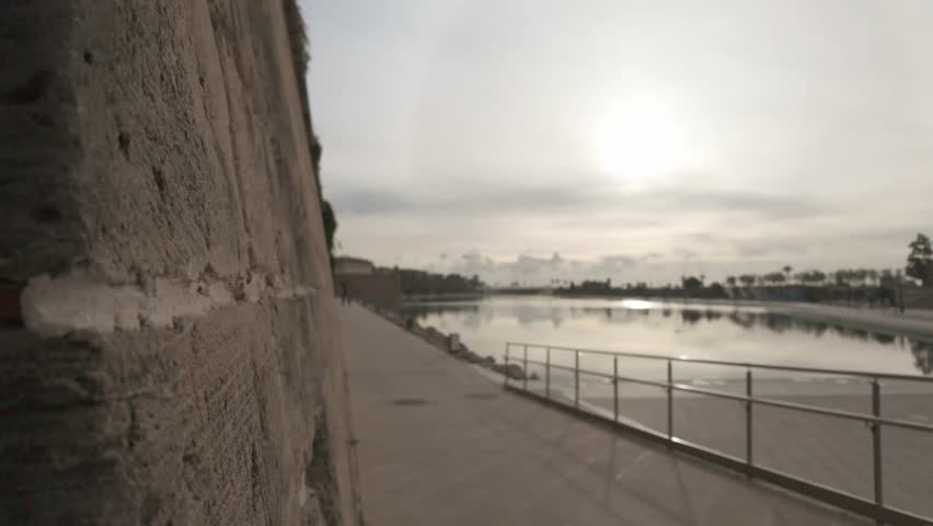Sunrise Panorama of Parc de la Mar and Ancient City Walls in Palma de Mallorca