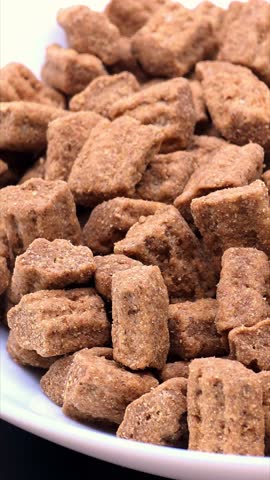 Dry dog food texture, pet meal. Healthy nutrition for animals, vertical video