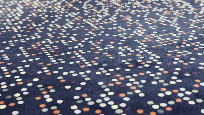 dark blue textile carpet fabric background features repeating geometric dot pattern colorful circles white orange purple shades arranged clusters rows soft fuzzy texture interior design flooring material decoration surface detail close up view home furnishing style modern decor abstract motif textile industry manufacturing material sample woven fiber indoor backdrop architectural element