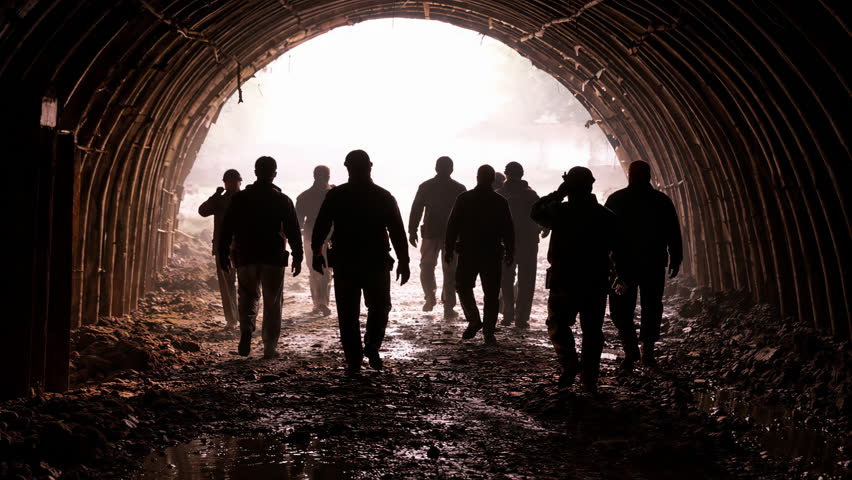 Miners Walking Out of Underground Tunnel, Backlit Silhouettes, Patagonia, Argentina