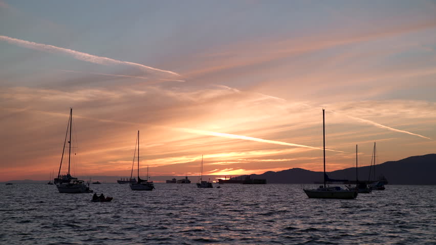 Kitsilano Sunset Anchorage Kayak 4K UHD.Sunset over English Bay from Kitsilano Beach. Vancouver, British Columbia. 4K, UHD.
