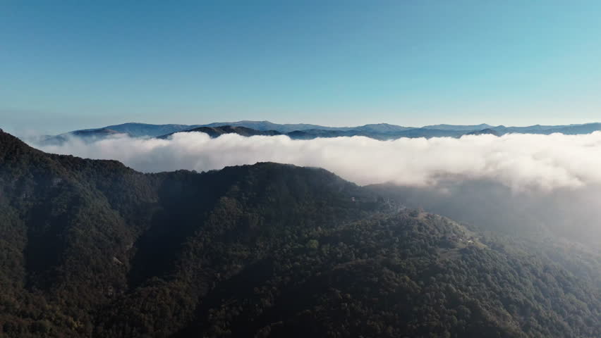 Mountain scene with clouds rolling over the hills. Calming and serene view
