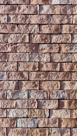Rough Brown Red Brick Wall Background Texture Pattern close-up Surface Detail with sunlight and shadow for Architecture Material Old Urban Building Wallpaper Backdrop