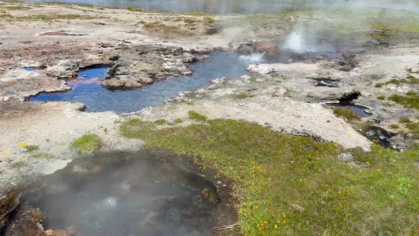 Boiling water bubbling from a hot spring on the Fountain Geyser Trail in Yellowstone National Park
