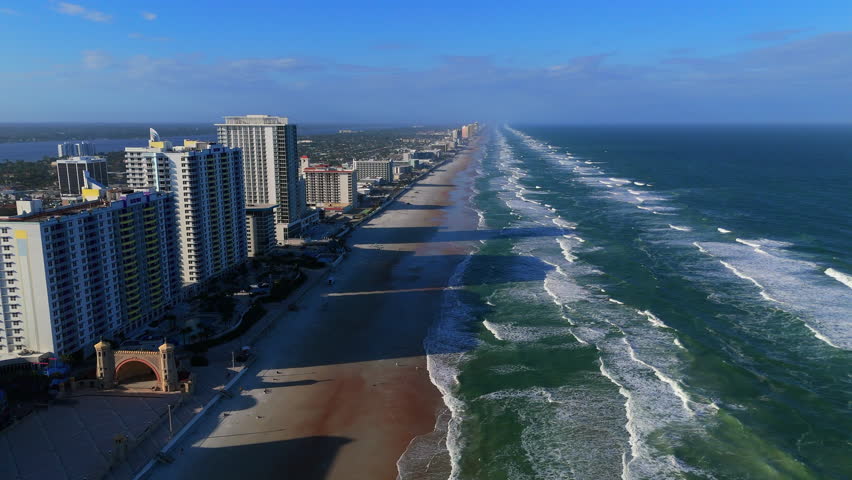 Aerial drone view of Daytona Beach Florida coastline and city skyline