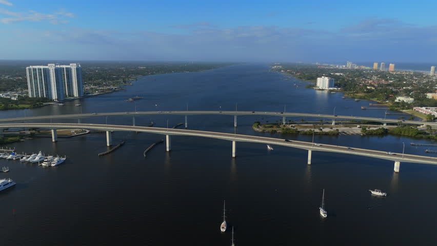 Aerial drone view of wide river with bridges near Daytona Beach Florida