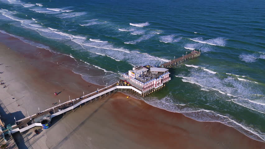 Overhead aerial view of Daytona Beach Florida coastline with ocean waves