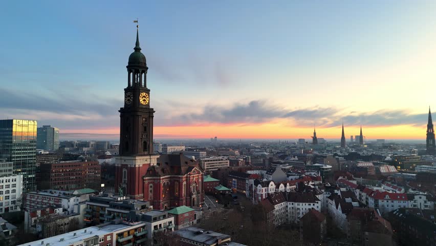 Aerial drone video (rotating) of the famous St. Michaelis Church at sunrise in Hamburg 