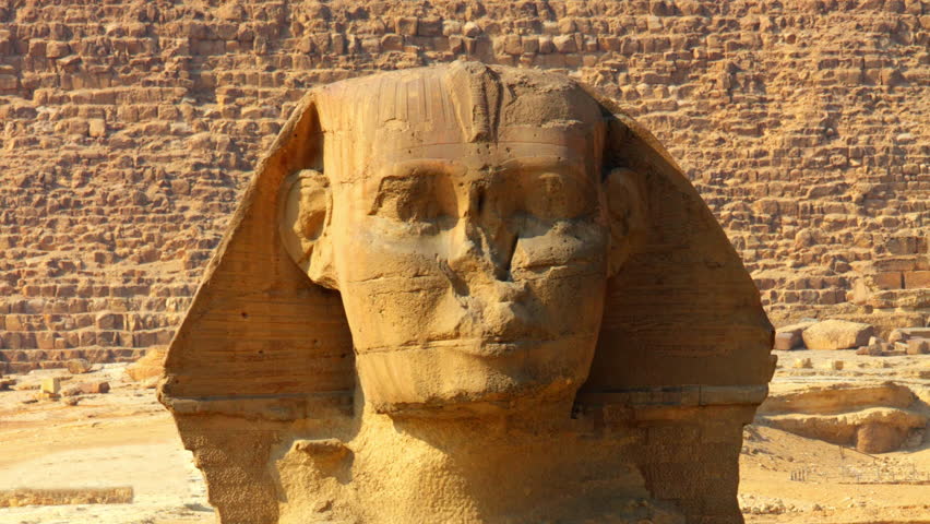 Famous ancient egypt sphinx head smiles and winks, Giza Cairo, Egypt