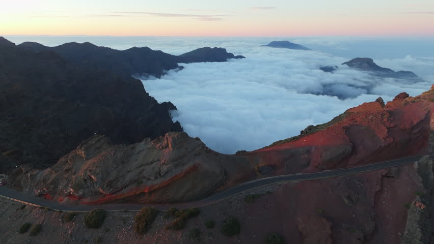 Aerial view of the volcanic Caldera de Taburiente with a sea of clouds during sunrise, La Palma