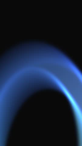 Vertical 4K seamless loop blue flame animation on black background with smooth flowing motion, powerful and energetic abstract fire visual for technology branding, futuristic design, digital displays, social media content, and professional motion graphics projects