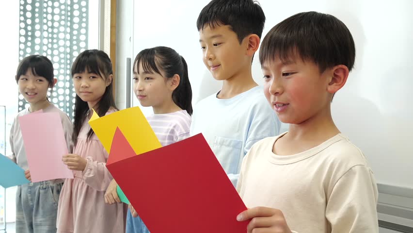 Elementary school students giving a presentation
