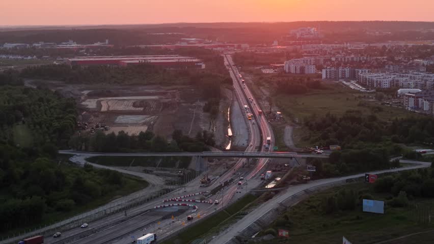 Construction of the new Tricity Metropolitan ring road in Pomerania at sunset. Poland