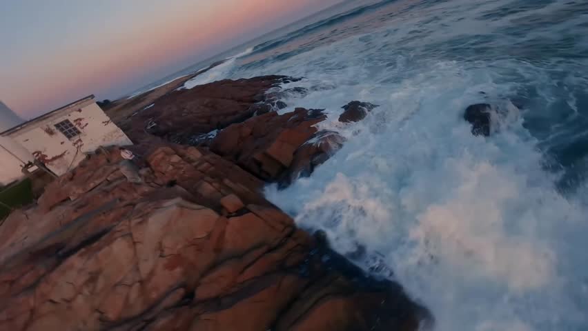 FPV Drone Aerial of Eastern Point Lighthouse at Sunset