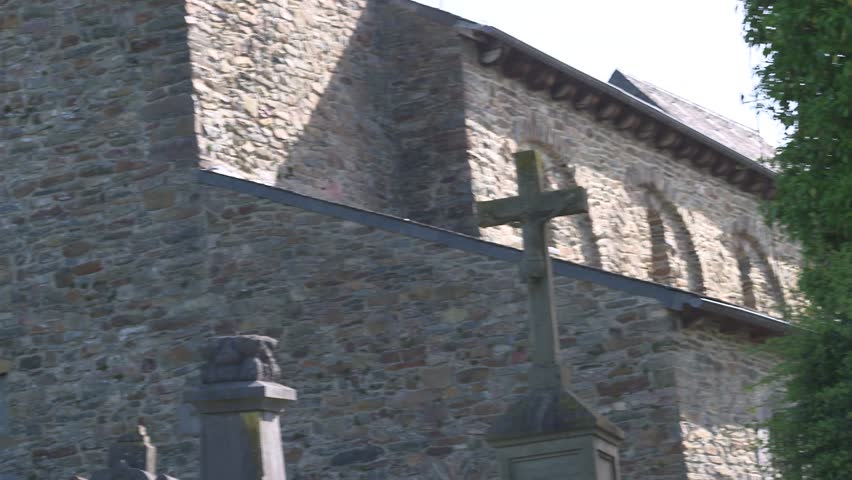Church Cemetery in Mid Day with Headstones