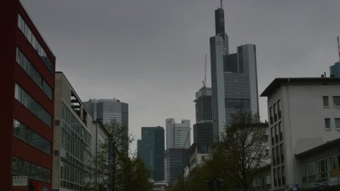 FRANKFURT,GERMANY - MAY 2013 Time lapse with zoom Berliner Strasse with Frankfurt financial district in background. One of Europe's most important center of finance.  