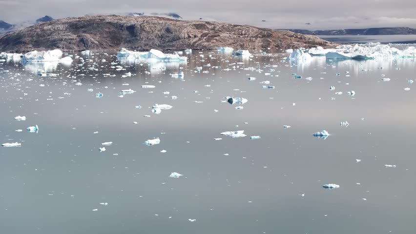 Tasiilaq is a small coastal town located on Ammassalik Island in East Greenland, near the Greenland Sea within the Arctic region. Known as one of Greenland’s largest settlements on the east coast, the town features colorful houses along a rocky shoreline, a traditional harbor, and dramatic surroundings of fjords, sea ice, icebergs, and Sermitsiaq Mountain. Tasiilaq represents traditional Inuit culture, Arctic daily life, and the remote geography of Greenland’s polar environment.