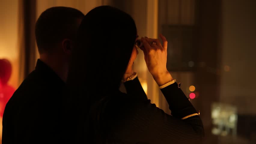 Romantic couple silhouette celebrating valentine