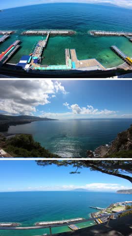 Aerial views of the coastline and seaside bathing platforms overlooking the clear waters of the Mediterranean Sea. Documentary footage showing coastal landscape, cliffs and summer tourism in southern Italy.