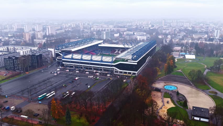 Stadion Miejski in Kraków, surrounded by dense urban architecture and park areas. Kraków, Poland