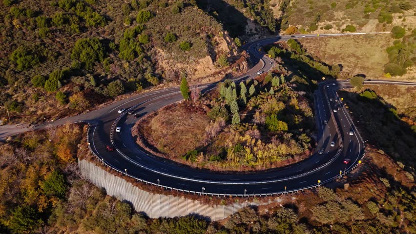 Aerial orbit of Panorama Point along the Rim of the World Scenic Byway with colorful autumn foliage and majestic mountains in the San Bernardino National Forest
