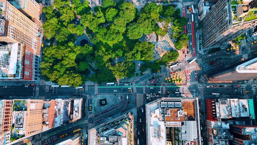 Greenery of Madison Park from top view. Drone footage over the Fifth Avenue in New York, USA.
