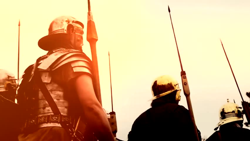Historical gladiator troop marching together, armored and ready for battle, evoking ancient warfare, strength, and epic combat scenes.