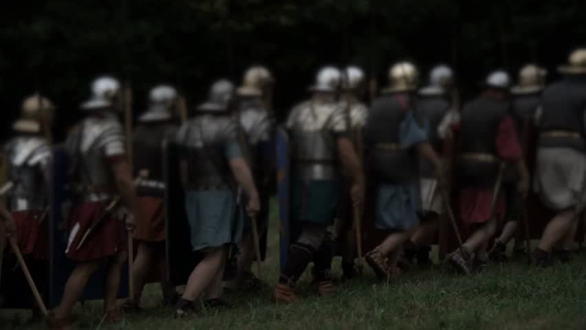 Retro vintage army soldiers marching together on a war battlefield, capturing historical military action, discipline, and epic wartime scenes.