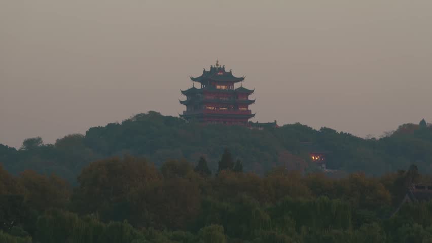 A distant view of the Chenghuang Pagoda, located on a hill overlooking the West Lake in Hangzhou,